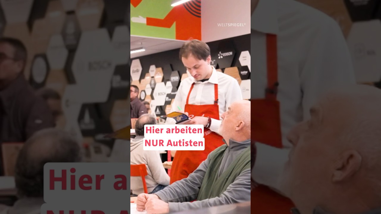 Autistischer Mitarbeiter deckt sorgfältig Tische in einer Pizzeria – Autisten im Beruf