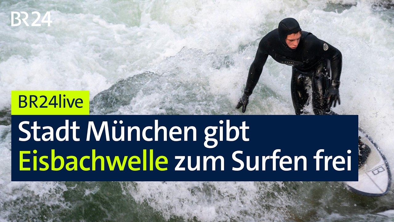 Surfer auf der Eisbachwelle München im Englischen Garten – Eisbachwelle München wieder freigegeben