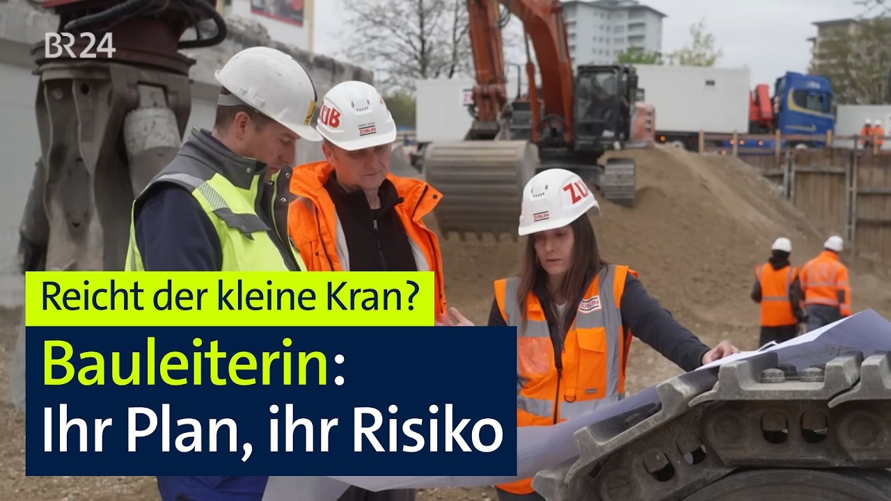Bauleiterin Asu steht auf einer Baustelle in München und koordiniert die Containerlieferung