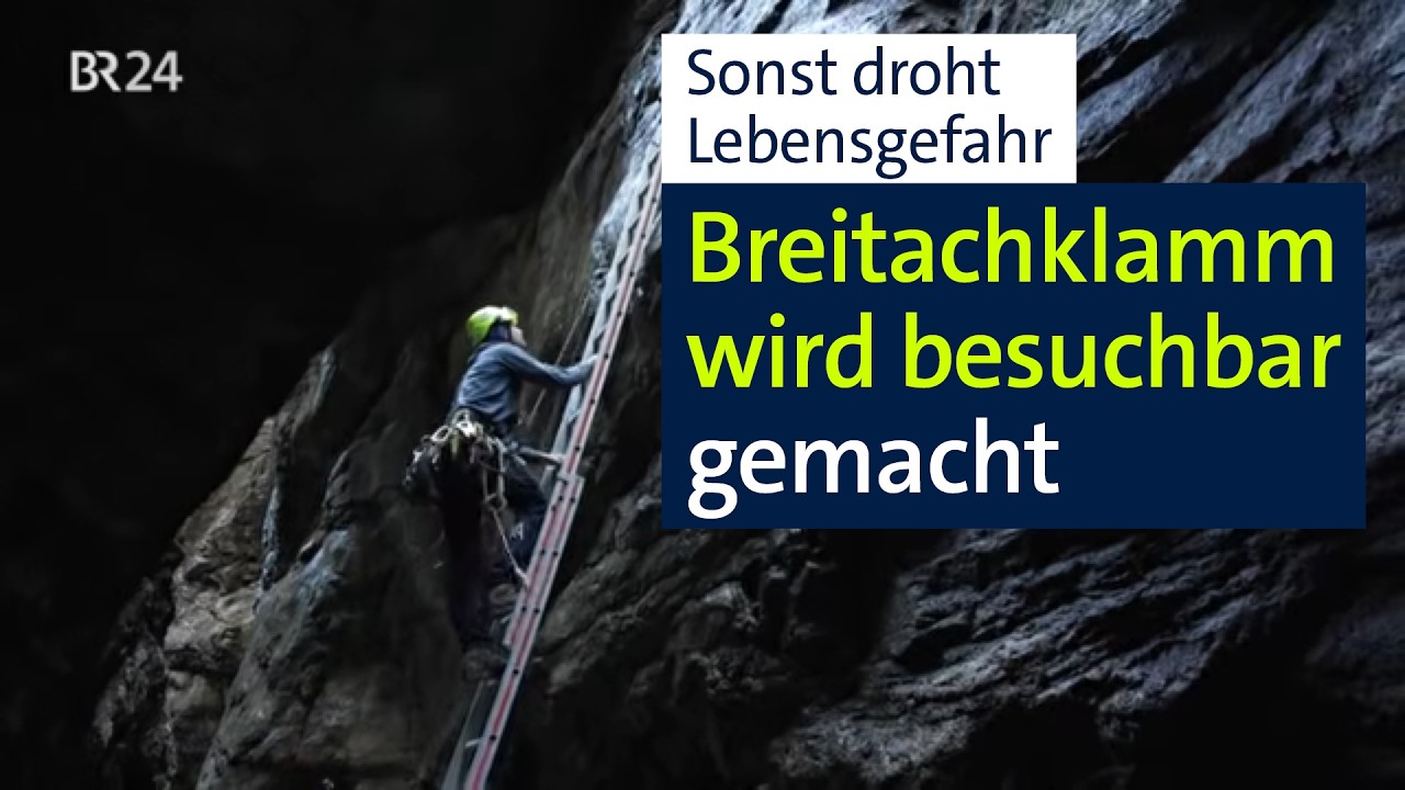 Industriekletterer sichert die steile Felswand in der Breitachklamm beim jährlichen Frühjahrsputz