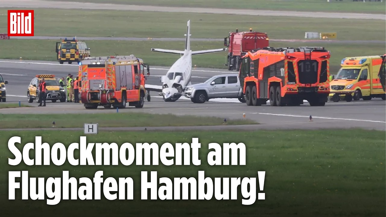 Bruchlandung Hamburg – Einsatzkräfte der Feuerwehr sichern nach einer Bruchlandung eines Kleinflugzeugs am Airport Hamburg d…