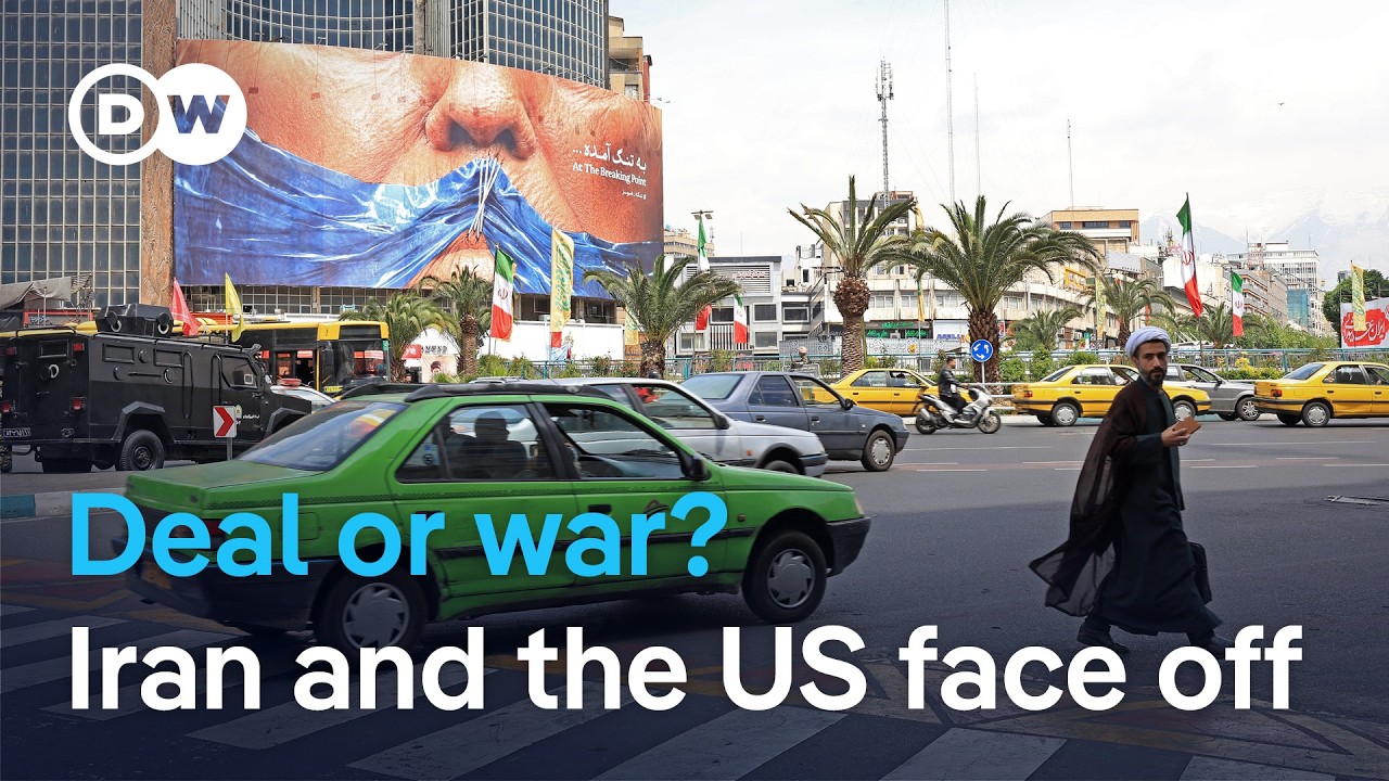 Iranische und US-amerikanische Flaggen vor Verhandlungstisch – Symbol für Iran USA Diplomatie und Friedensgespräche