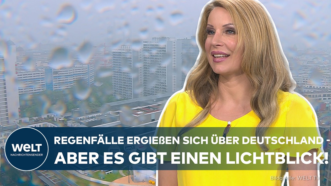 Dunkle Regenwolken über einer deutschen Stadtlandschaft – Regenfront Deutschland zieht durch