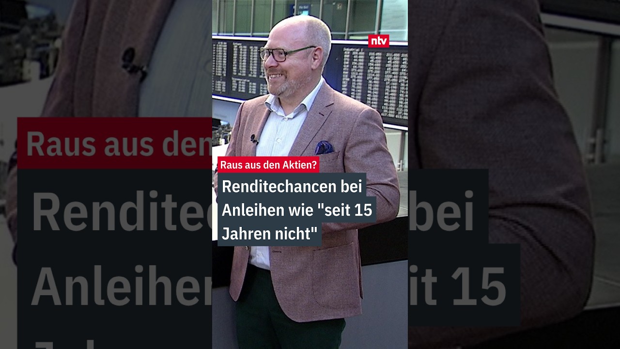 Finanzchart mit steigenden Anleihen-Renditen und Börsenkursen auf einem Bildschirm