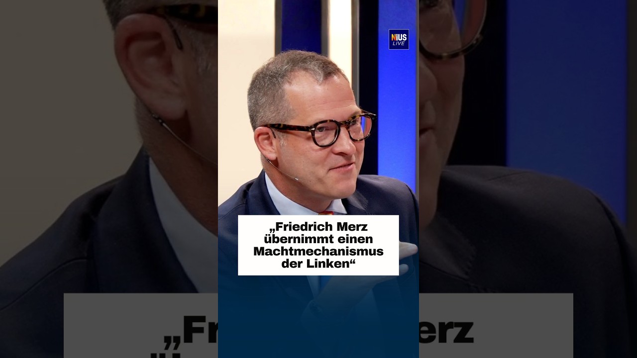Friedrich Merz bei einer Pressekonferenz – Klimaleugner Debatte in der deutschen Politik