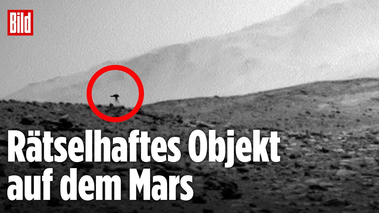 Kamerafehler Mars – Vergrößerte NASA-Aufnahme des Mars-Rovers Curiosity mit quillenförmigem Kamerafehler am Marshorizont