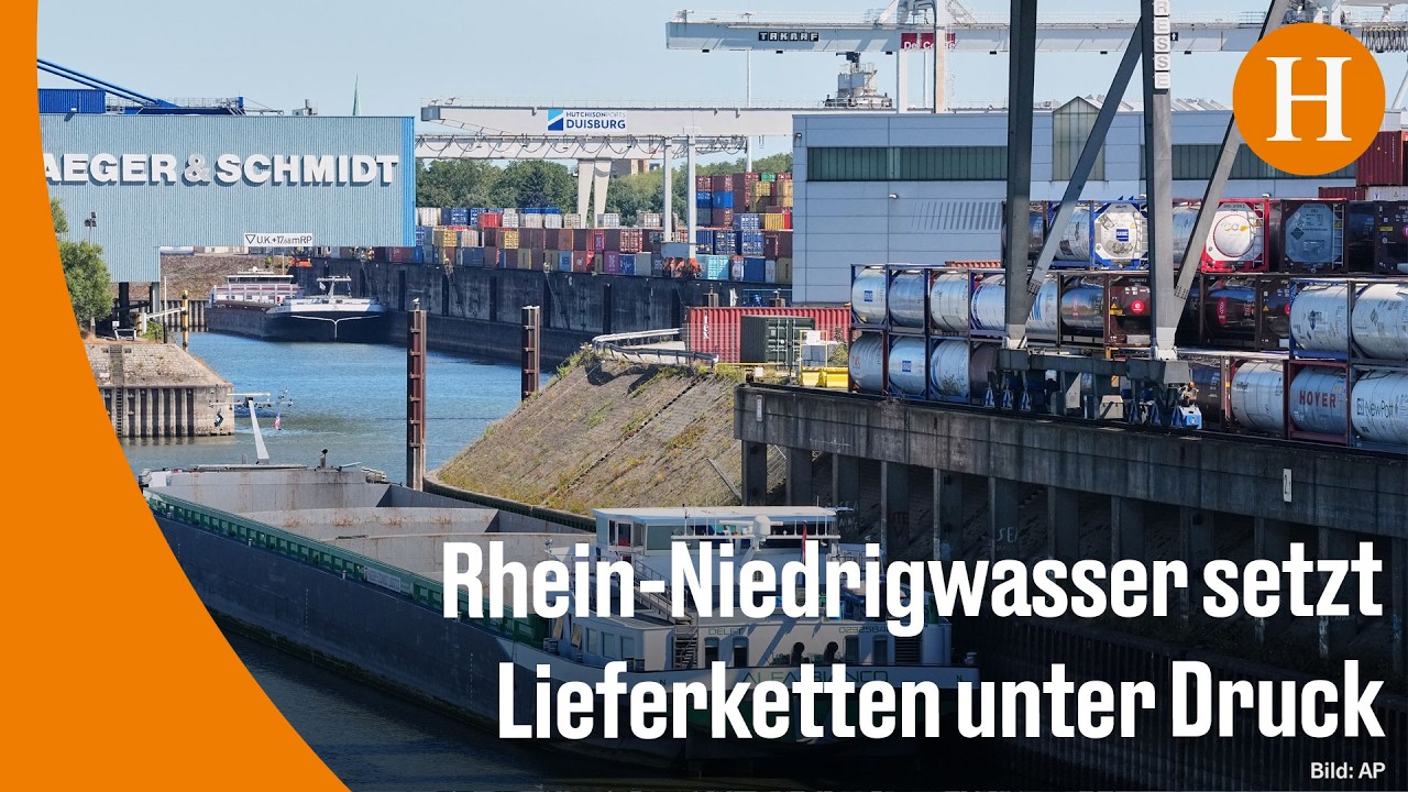Niedrigwasser Rhein – Frachtschiff mit reduzierter Ladung auf dem Rhein bei Niedrigwasser nahe Duisburg
