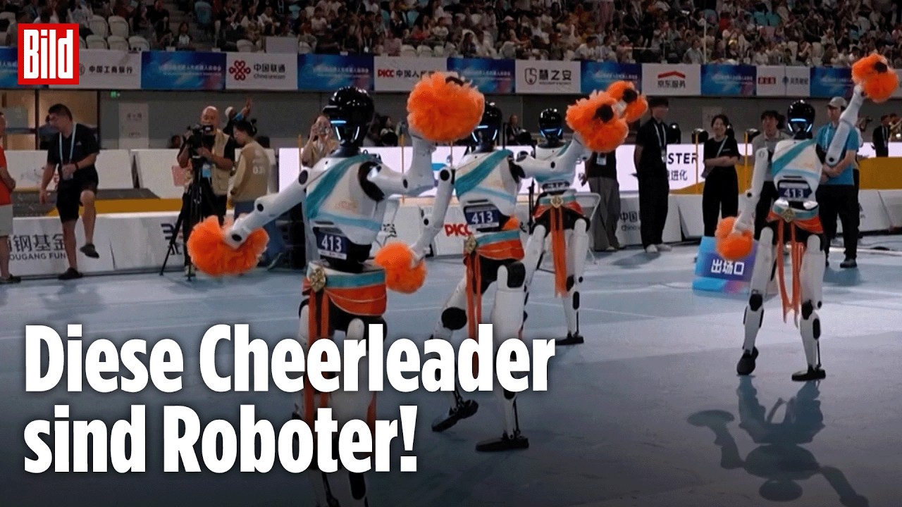 Humanoide Roboter bei der Roboter-Olympiade in Peking treten beim Cheerleading mit Pompons gegeneinander an