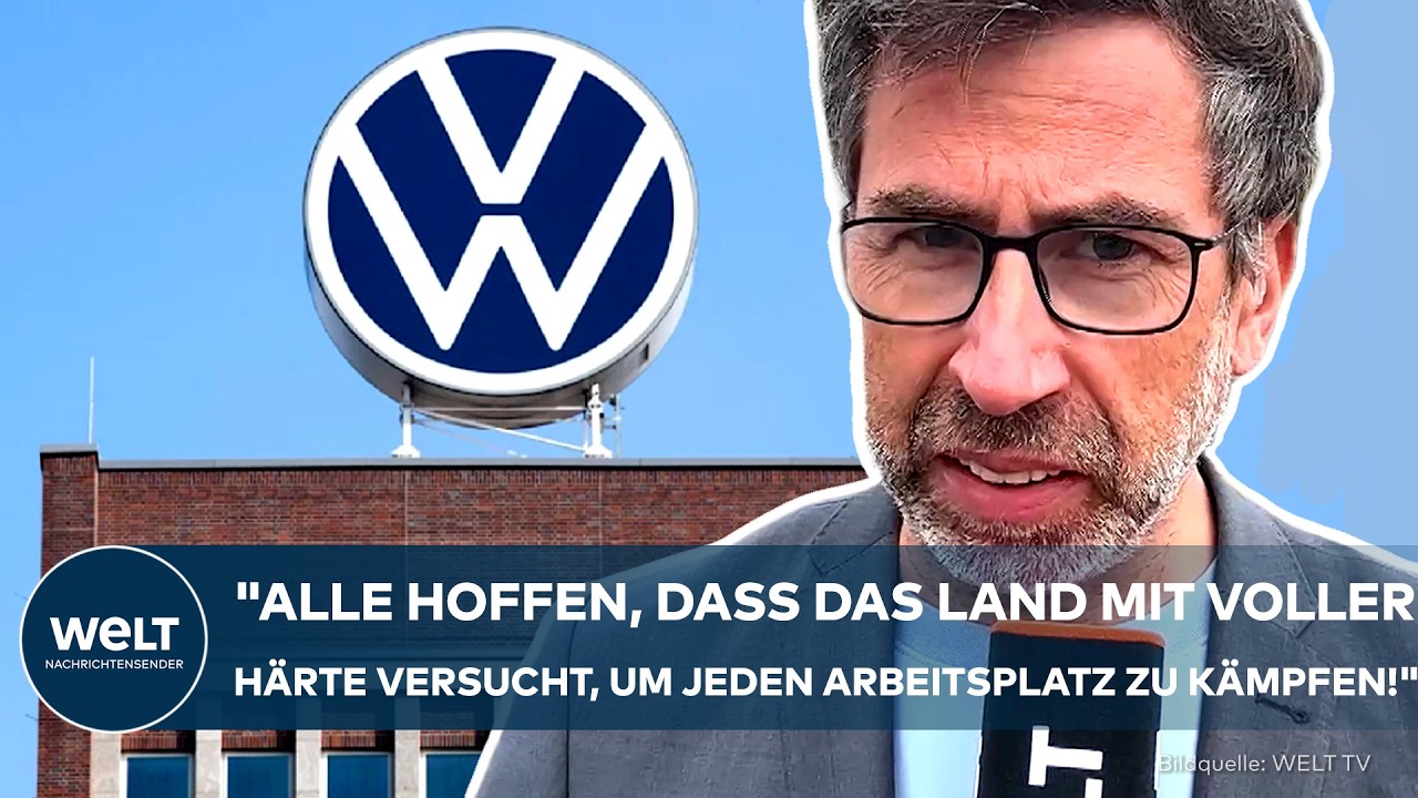 VW-Werk Wolfsburg mit Belegschaft bei Betriebsversammlung – drohender VW Stellenabbau versetzt Mitarbeiter in Sorge