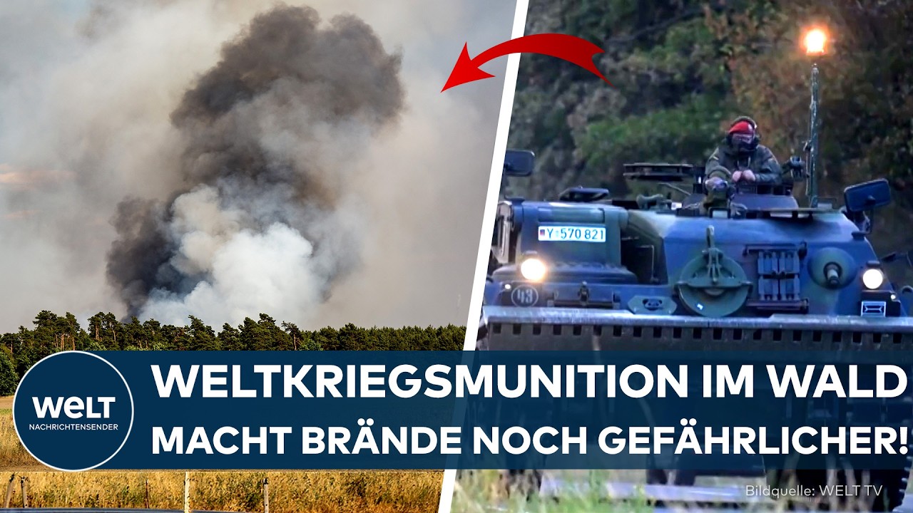 Löschhubschrauber wirft Wasser über dem brennenden Waldbrand Hürtgenwald in der Nordeifel ab