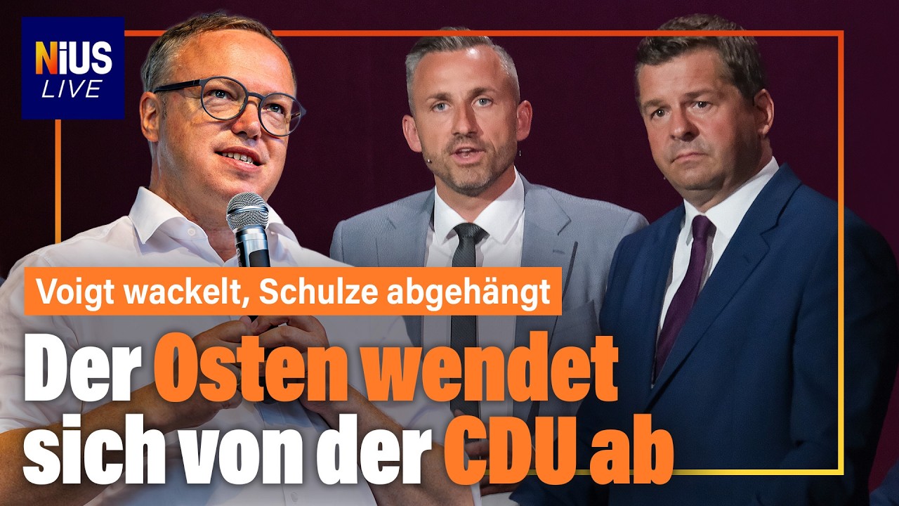 Wahlplakate zur Landtagswahl Sachsen-Anhalt mit CDU- und AfD-Logos vor dem Magdeburger Landtag