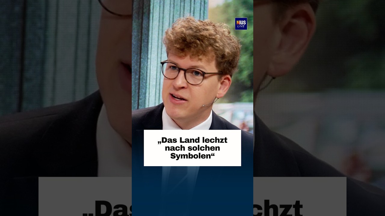 Menschen verschiedener politischer Überzeugungen beim gemeinsamen Gespräch – Symbol für gesellschaftliche Versöhnung im Allt…