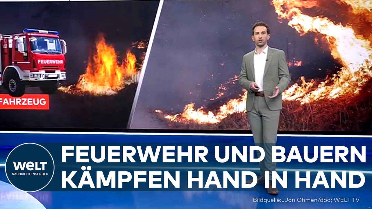 Landwirt mit Traktor und Wasserfass im Einsatz beim Waldbrand Schramberg neben Feuerwehrfahrzeugen