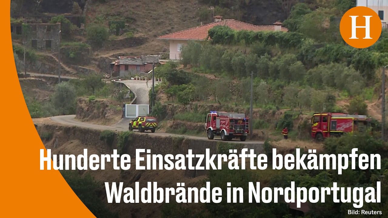Waldbrand Portugal – Feuerwehrleute bekämpfen einen Waldbrand in Portugal mit Löschfahrzeugen und Hubschraubern