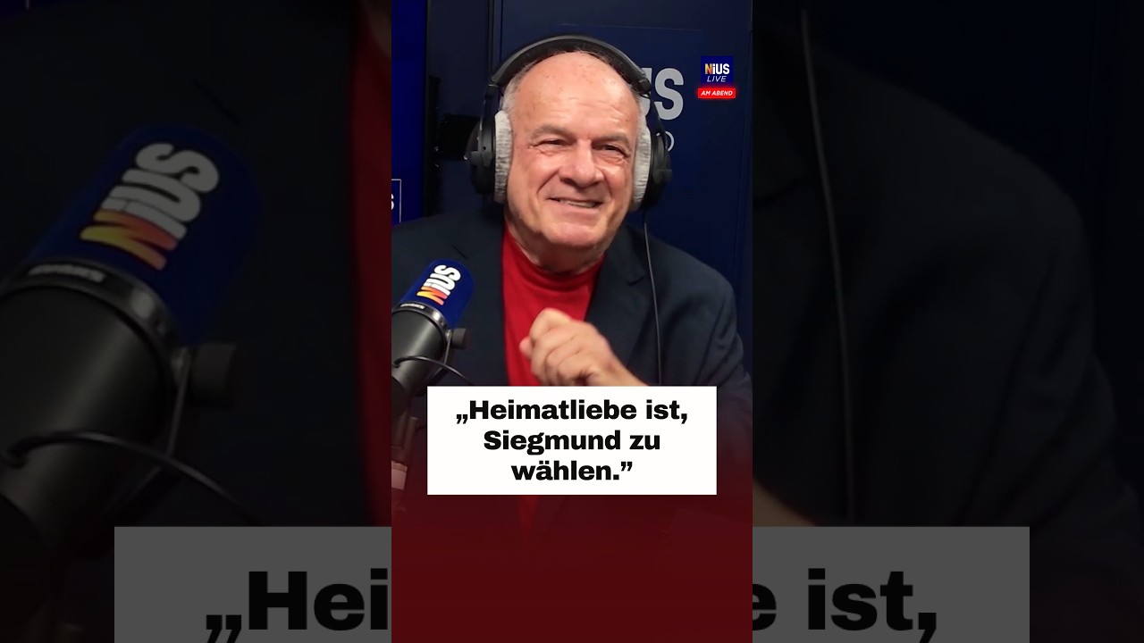 Siegmund wählen – Wahlplakat mit dem Slogan Heimatliebe ist Siegmund zu wählen bei einer politischen Kundgebung in Deutschla…