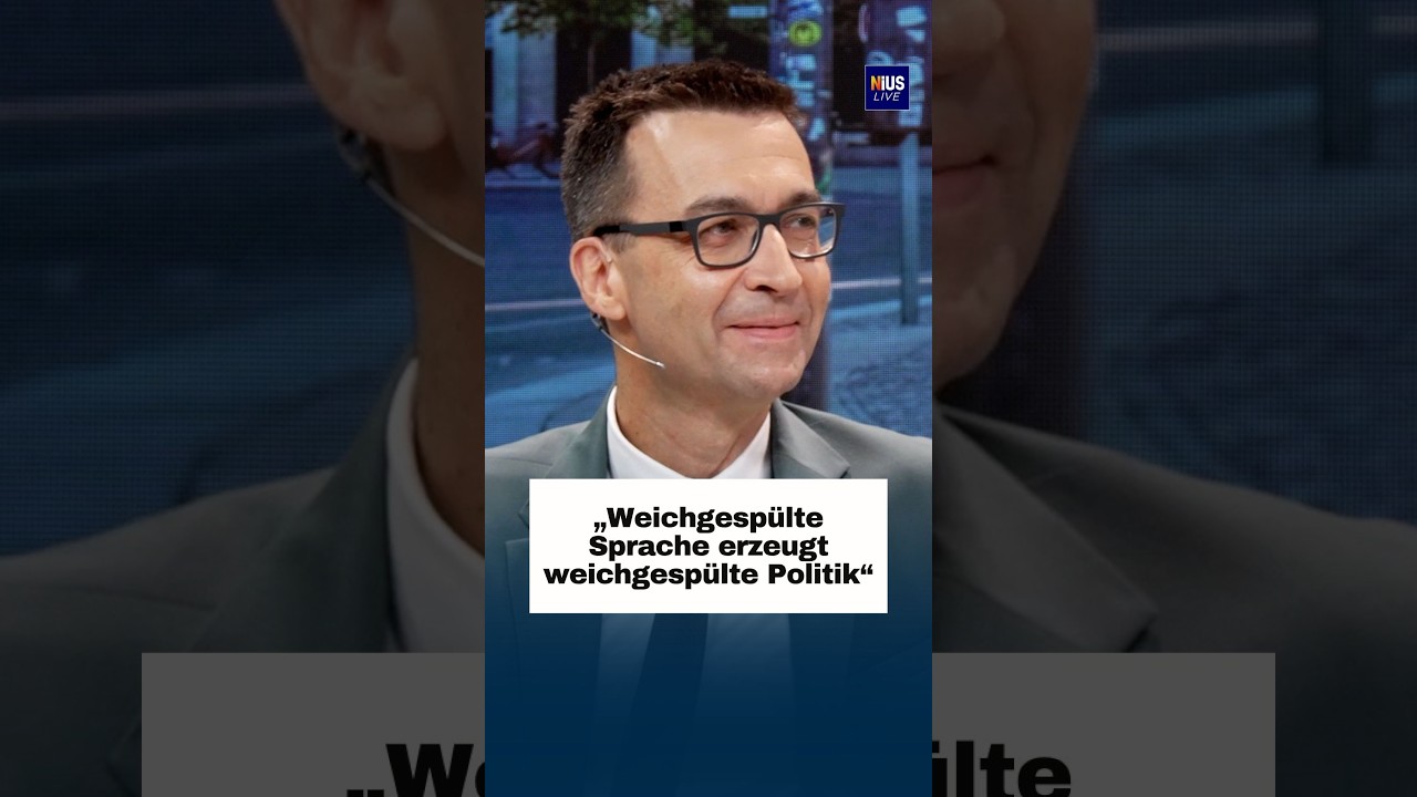 Mikrofon an einem Rednerpult als Symbol für weichgespülte Sprache in der öffentlichen politischen Debatte