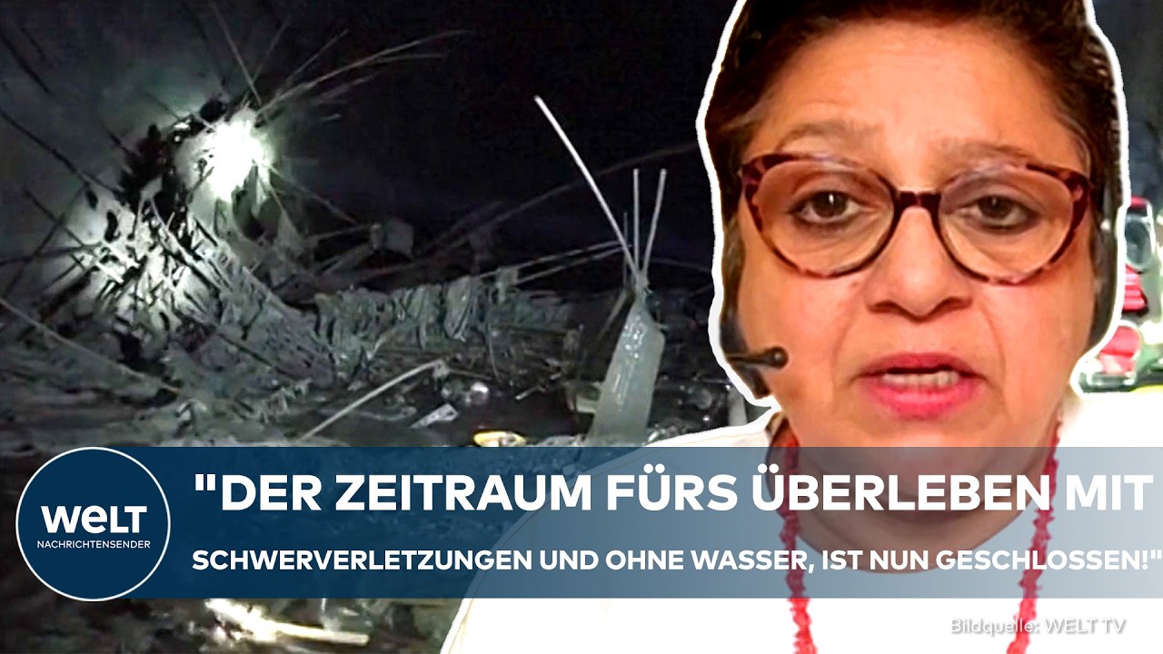 Rettungskräfte arbeiten sich nach der Nepal Flut durch Schlamm und Geröll zu verschütteten Tunneln vor