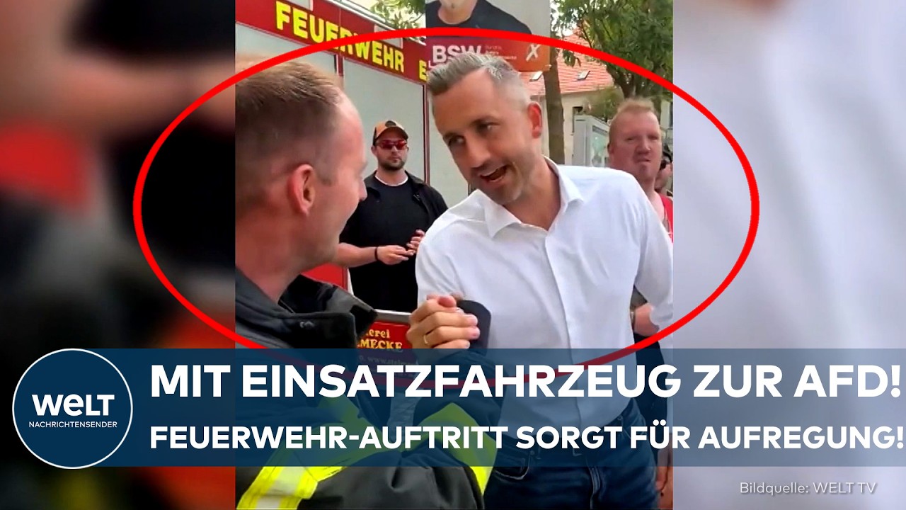 Feuerwehr AfD-Veranstaltung – Feuerwehrleute in Dienstuniform posieren bei einer AfD-Veranstaltung in Egeln, Sachsen-Anhalt