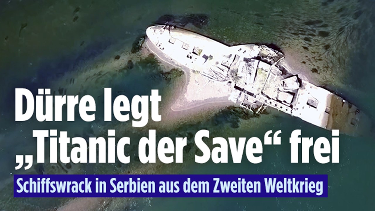 historisches Wrack Serbien – Rostiges historisches Wrack des Dampfschleppers Slovenac ragt bei Sremska Mitrovica aus dem Flu…