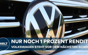 VW-Logo an einem Volkswagen-Werk, symbolisiert die gesenkten VW Gewinnprognose und den Sparkurs des Konzerns