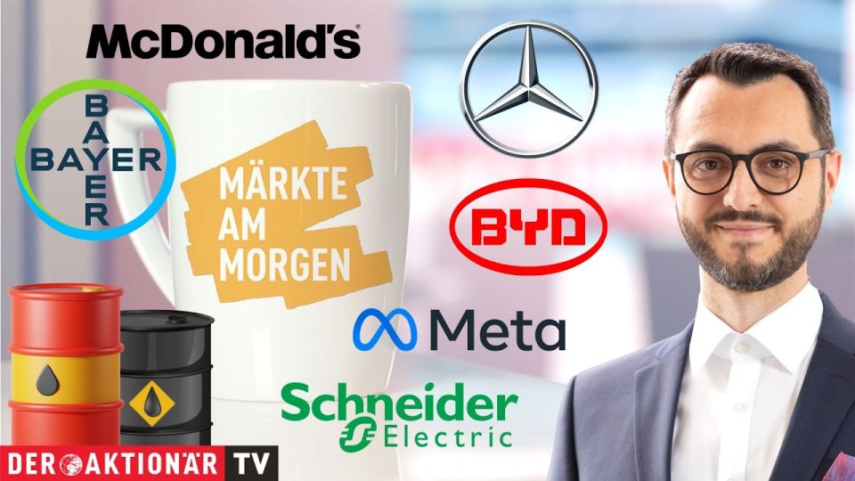 Händler an der Frankfurter Börse verfolgen die Märkte am Morgen auf digitalen Anzeigetafeln mit DAX-Kursverlauf