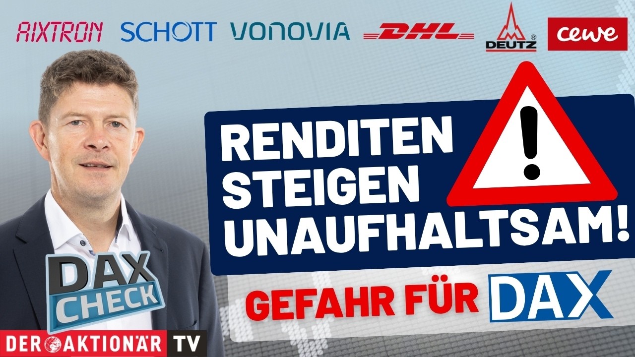 Händler an der Frankfurter Börse verfolgt DAX-Check-Kurstafel mit sinkenden Notierungen für Aixtron und Vonovia
