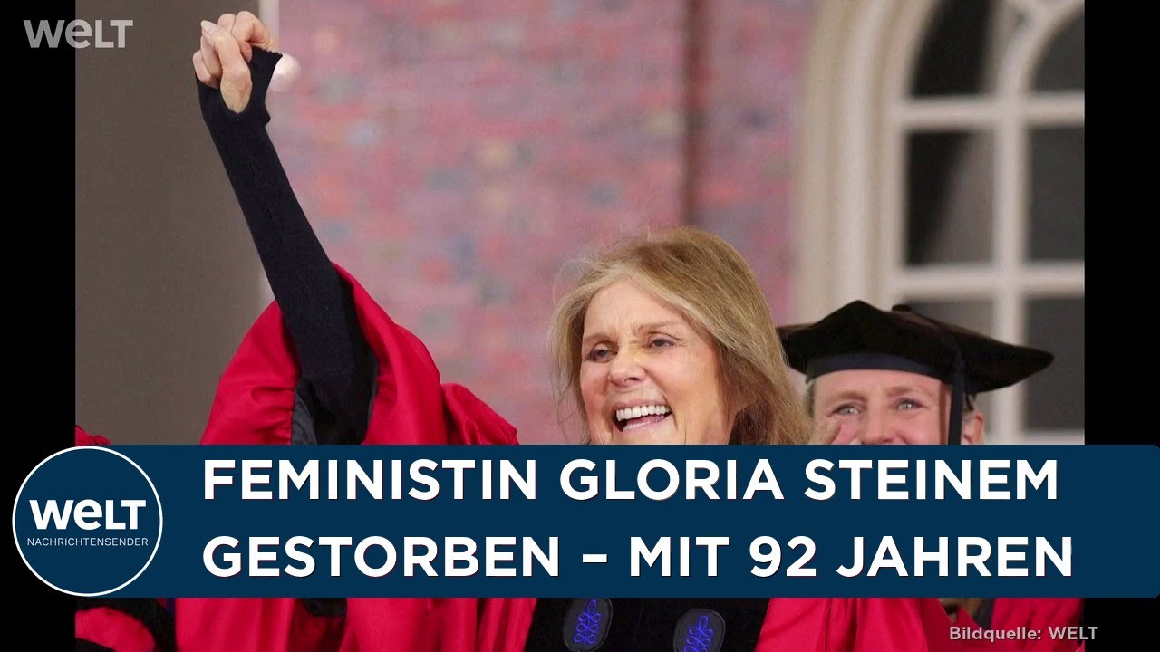 Gloria Steinem bei einer Kundgebung für Frauenrechte, die Faust erhoben als Symbol des Feminismus