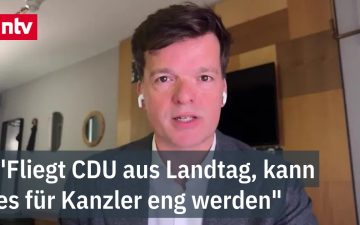 Kanzlerkrise Merz – Friedrich Merz am Rednerpult, symbolisch für drohende Kanzlerkrise nach CDU-Niederlagen bei Landtagswahl…