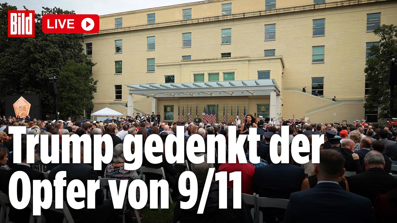 Gedenkzeremonie zum 9/11-Gedenken im Pentagon mit US-Präsident Trump und einer entfalteten amerikanischen Flagge am Gebäude