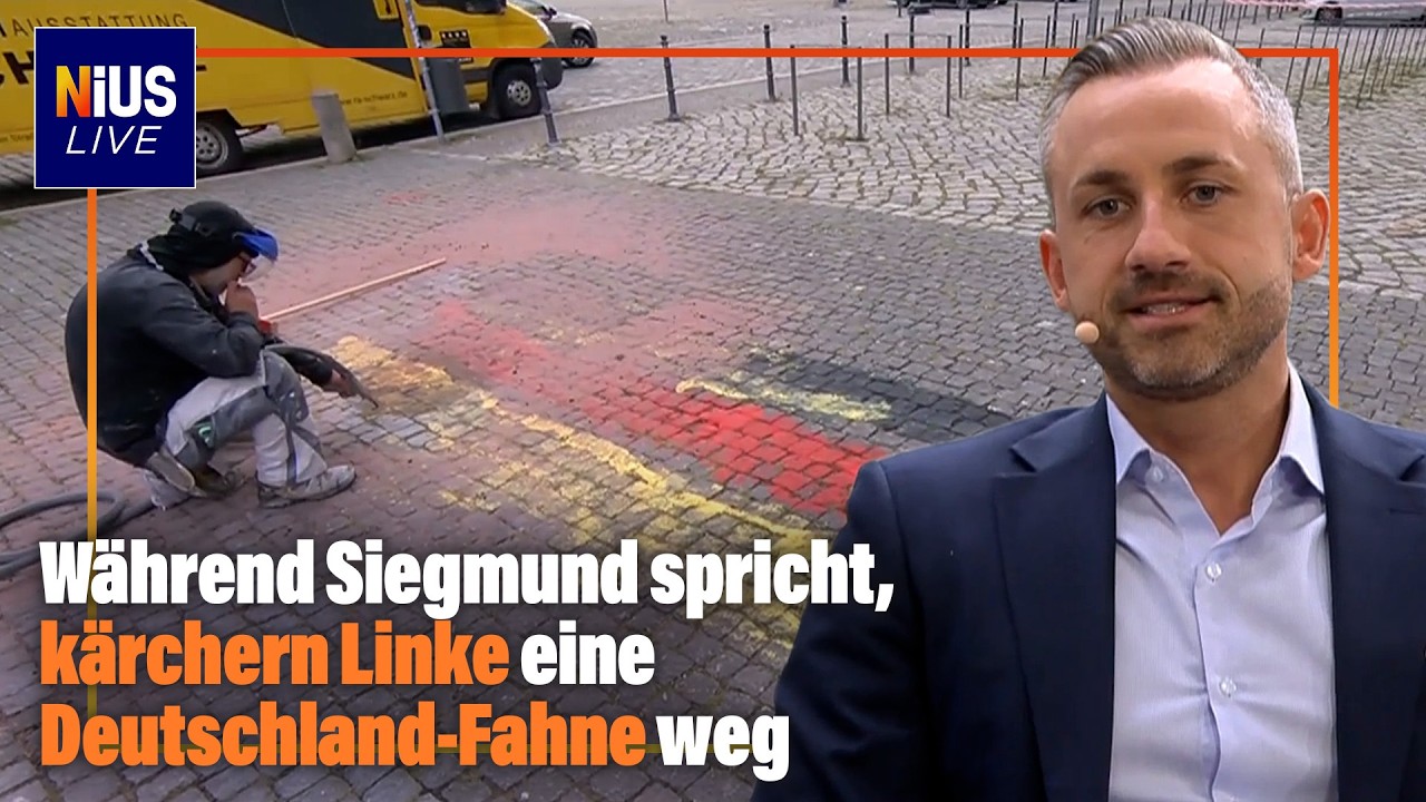 Deutschlandfahne Antifa-Fest – Eine auf den Boden gemalte Deutschlandfahne wird vor dem Antifa-Fest in Magdeburg entfernt – …