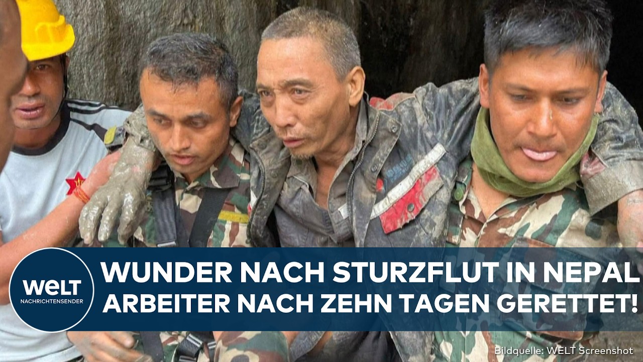 Tunnelrettung Nepal – Rettungskräfte bergen einen Arbeiter nach der Tunnelrettung in Nepal aus einem überfluteten Stollen