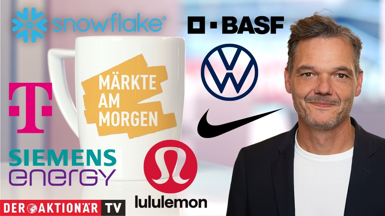 Händler an der Frankfurter Börse verfolgen die Märkte am Morgen auf Bildschirmen mit DAX-Kurven
