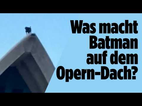 Batman Day Sydney – Batman-Darsteller auf dem Dach des Sydney Opera House beim Batman Day, inszeniert von DC Comics und HBO