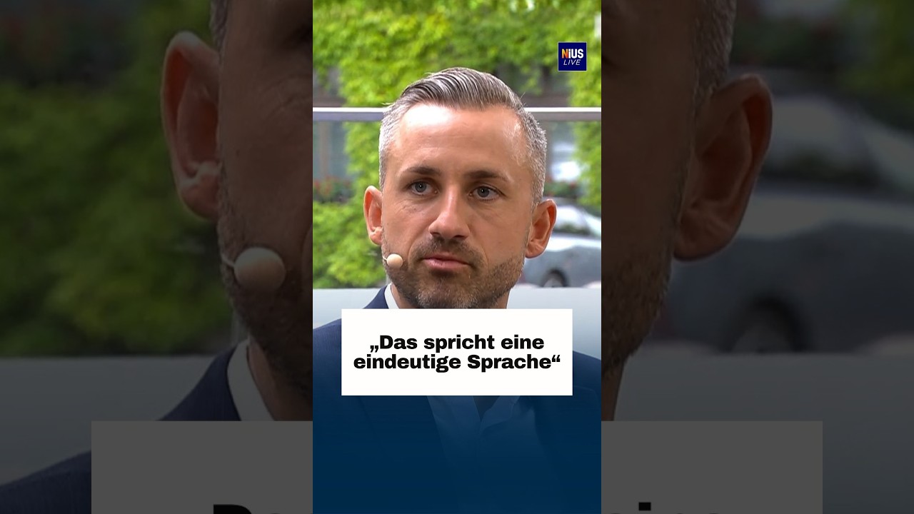 Deutschlandfahne entfernt – Deutschlandfahne auf Straßenboden in Magdeburg wird vor einem Demokratiefest entfernt