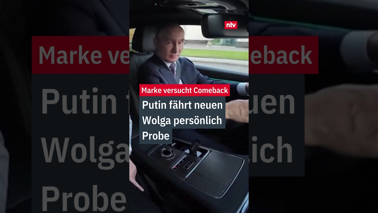 Wladimir Putin sitzt am Steuer des neuen Wolga K50 SUV mit chinesischem Motor bei einer Probefahrt