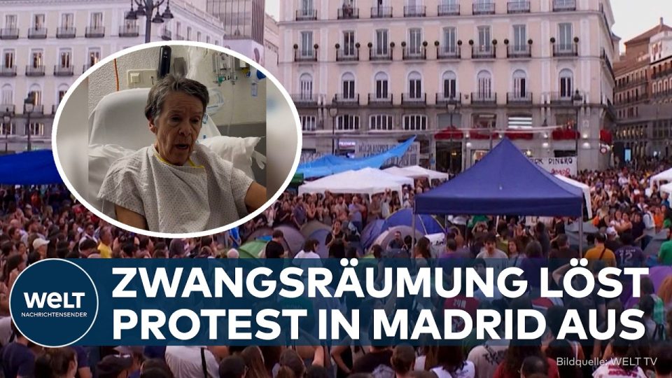 Wohnungsnot Spanien – Demonstranten in Madrid protestieren gegen Wohnungsnot in Spanien und halten Transparente für Mietersc…