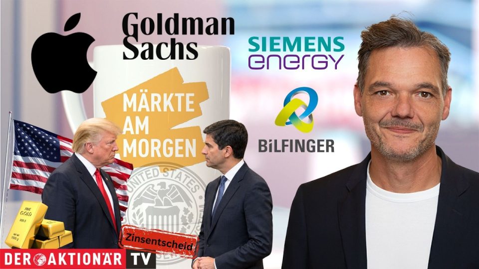 Zinserhöhung Fed – Händler an der Wall Street verfolgt auf Bildschirmen die Kursentwicklung nach der Zinserhöhung der Fed