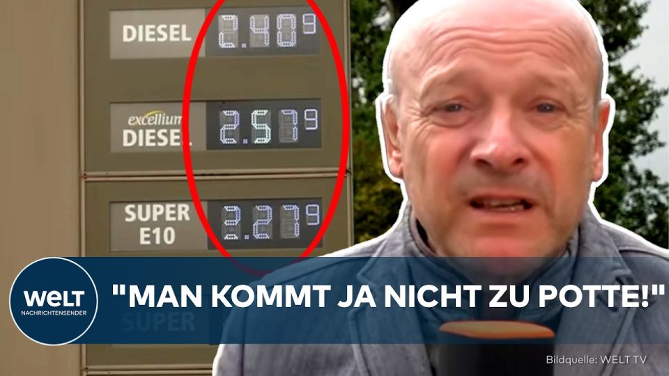 Autofahrer an einer Tankstelle mit Preisanzeige für hohe Spritpreise bei Diesel und Super E10