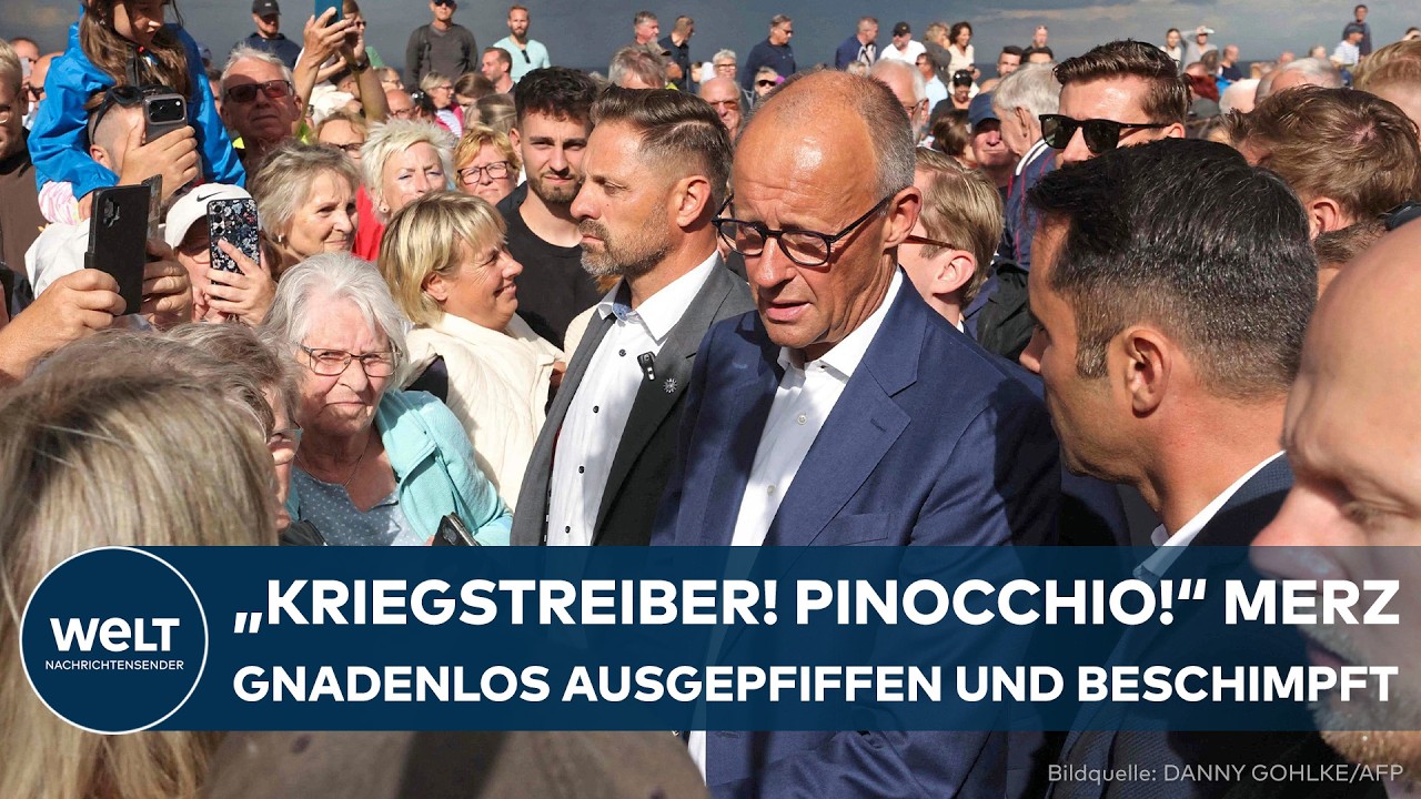 Merz Wahlkampf Ostdeutschland – Friedrich Merz bei Wahlkampfauftritt in Ostdeutschland, umgeben von protestierenden Bürgern …