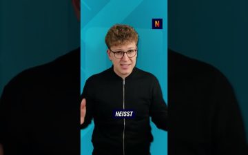 Bezahlkarte Asylbewerber – Symbolbild zur Bezahlkarte für Asylbewerber – Plastikkarte vor dem Hintergrund eines Behördengebä…