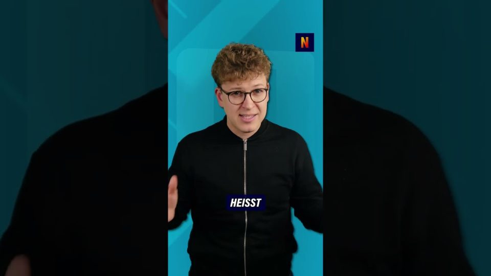 Bezahlkarte Asylbewerber – Symbolbild zur Bezahlkarte für Asylbewerber – Plastikkarte vor dem Hintergrund eines Behördengebä…