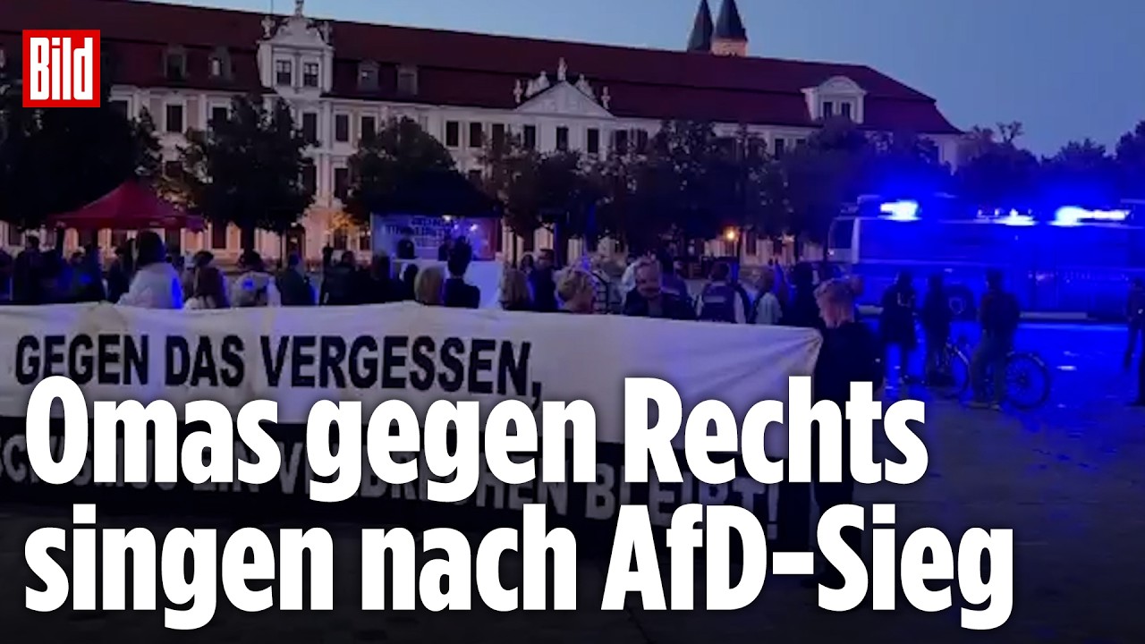 Ältere Frauen der Bewegung Omas gegen Rechts demonstrieren singend in Magdeburg gegen den AfD-Wahlerfolg