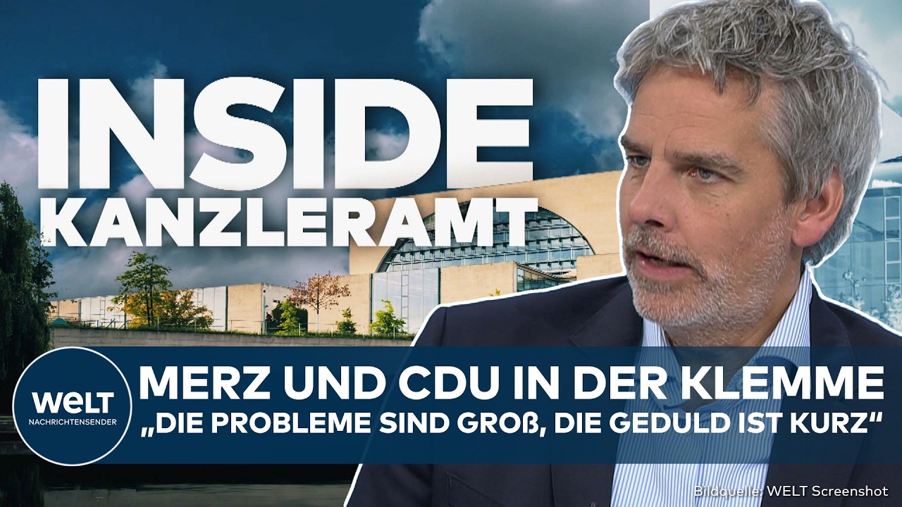 Friedrich Merz am Rednerpult bei einem CDU-Wahlkampfauftritt, umgeben von Parteifahnen