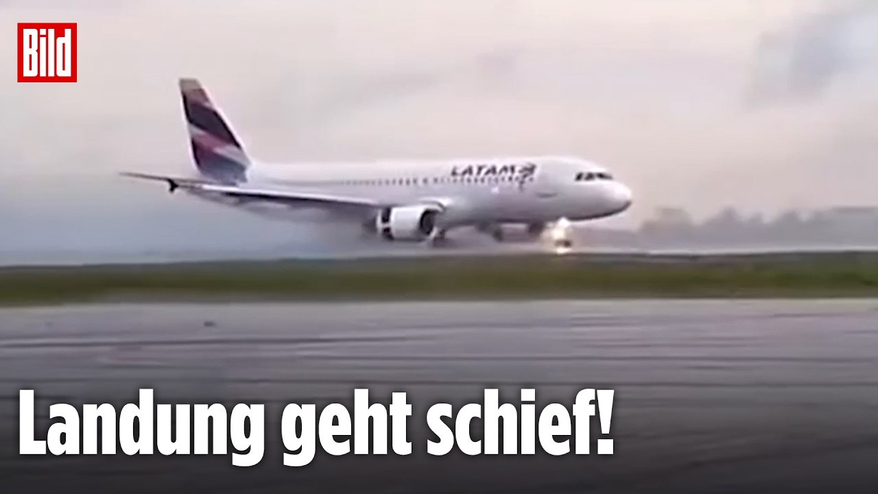 Flugzeug rutscht von Landebahn – Ein Airbus A320 steht nach dem Ausrutschen von der Landebahn auf einem schlammigen Grünstre…