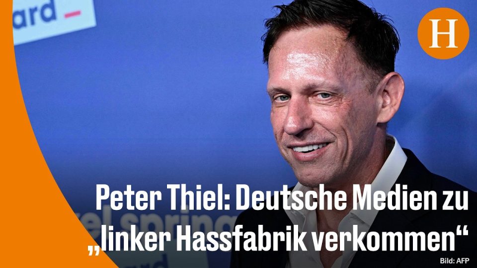 Peter Thiel nimmt den Axel-Springer-Award in Berlin entgegen, im Hintergrund das Verlagsgebäude