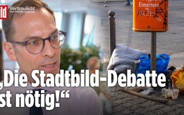 Boris Rhein und Friedrich Merz bei einer CDU-Veranstaltung, Stadtbild-Debatte zur Migration im Fokus
