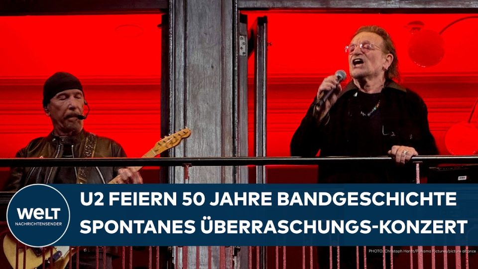 U2 Jubiläum – U2 spielen ein Überraschungskonzert vom Balkon in der Grafton Street Dublin zum 50. U2-Jubiläum