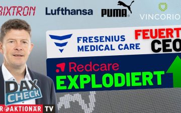 DAX Zinsen – Händler an der Frankfurter Börse blickt auf fallende DAX-Kurse auf Monitoren – steigende Zinsen belasten den Ma…