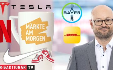 Börsenkurse auf einem digitalen Display – Märkte am Morgen mit Nike, Tesla, Netflix, Bayer und DHL Group im Fokus