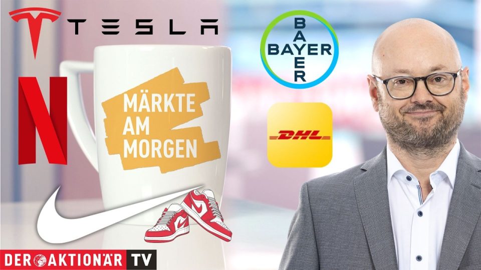 Börsenkurse auf einem digitalen Display – Märkte am Morgen mit Nike, Tesla, Netflix, Bayer und DHL Group im Fokus